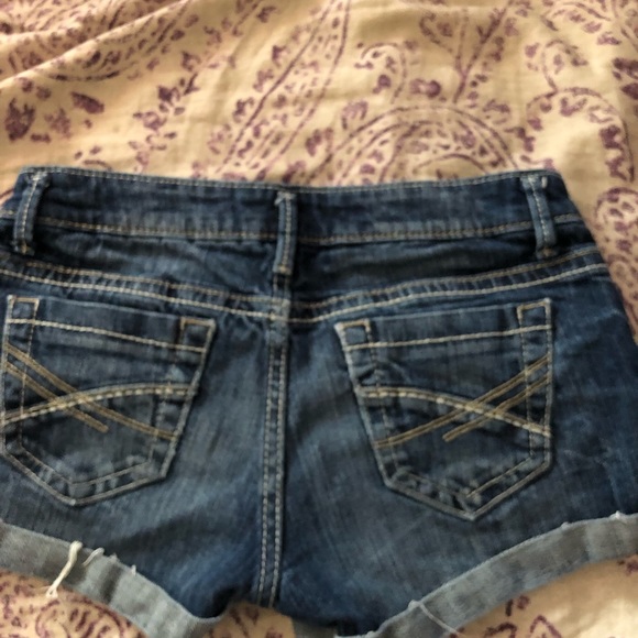 Blue dark wash jean shorts. - Picture 2 of 3